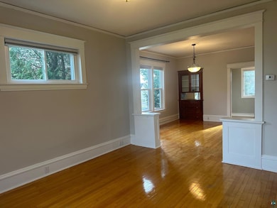 Unfurnished room featuring ornamental molding and 