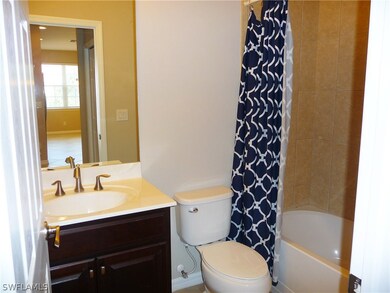 The Guest Bathroom has a bath tub/shower combo and