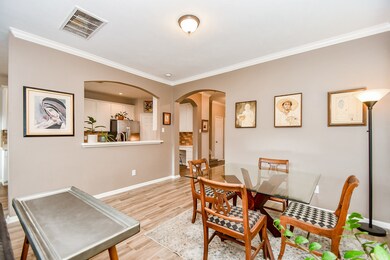 The kitchen area overlooks the dining and family rooms.