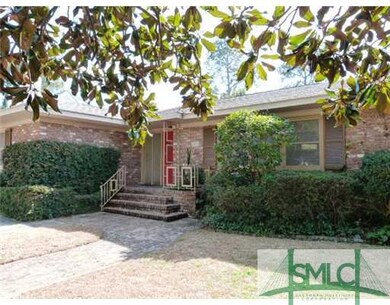 Exterior Front. Great mid-century Savannah Grey br