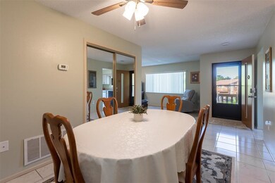 Enter into the foyer, dining room and living room!