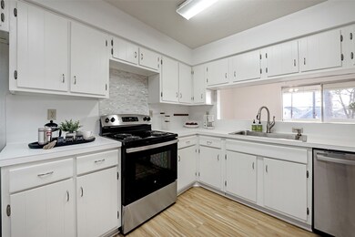 Well appointed kitchen features a new (2025) range