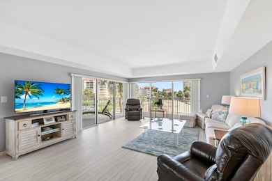 Living area surrounded by sliders