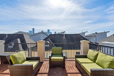 A large roof top terrace with partial views of Dow