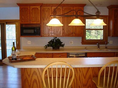 Kitchen. Hardwood floors just refinished. New Pell