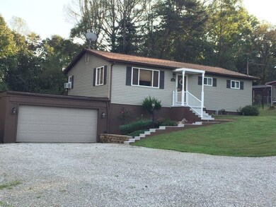 Two car attached garage with room for a boat or RV