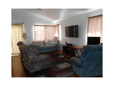Property Photo. Living room has vaulted ceilings a