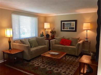 Beautiful hardwood floors and crown molding.