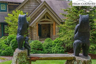 Bears overlooking the home were cared from two tre