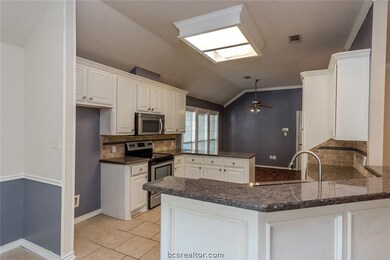 Kitchen with granite counters