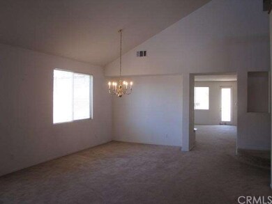 Dining room with entry to family room and kitchen