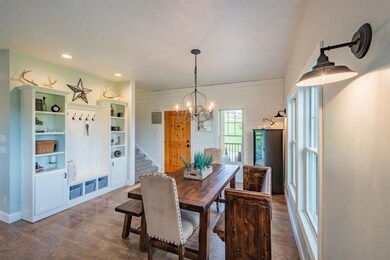 Dining Room w/ Shiplap wall & carpenter made built