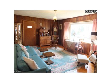 Living room with hardwood floors.