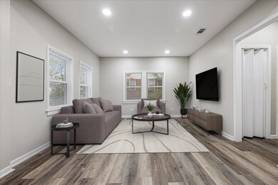 Living area featuring recessed lighting and wood finished floors