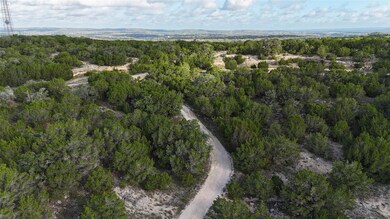 View of property location with a forest