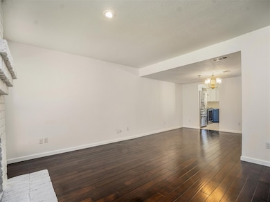 Living area leads to dining area/office/study and then to kitchen.
