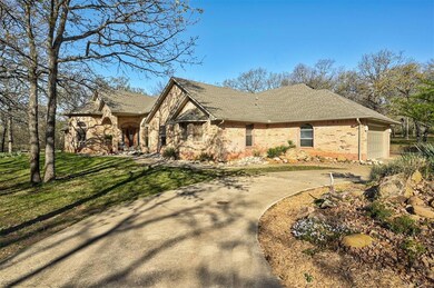 View of front of house featuring a front lawn and 