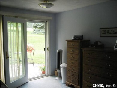 Master Bedroom. Double doors to the patio area. Th
