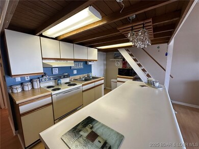 237 Southwood Shores Cir unit 3B, Village of Four Seasons, MO 65049 - photo 7