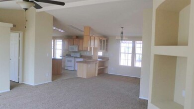 LIVING ROOM LOOKING TOWARDS KITCHEN