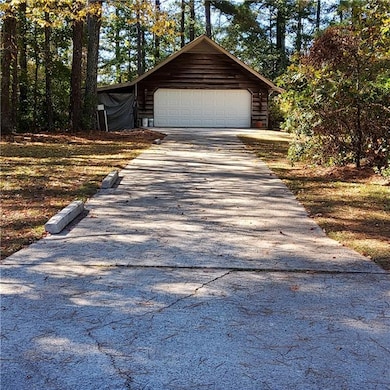 Driveway entry to Home and garage.