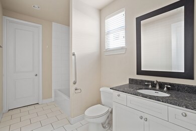 1st floor bathroom has a tub/shower combination; g