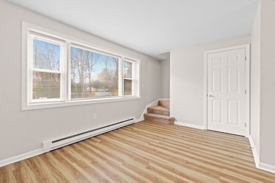 As You Enter, A Picture Window Floods The Unit With Natural Light