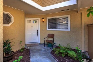 Beautifully landscaped private, gated entry.
