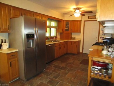 Kitchen with ceramic flooring.  New dishwasher 201