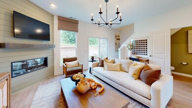 ***This photo was taken from the Grisham model home in Adams Preserve***  The Great Room offers plenty of space for relaxation after a long day's work.