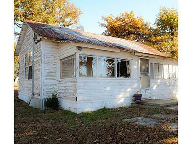 Exterior Front. Home faces the lake with lots of w