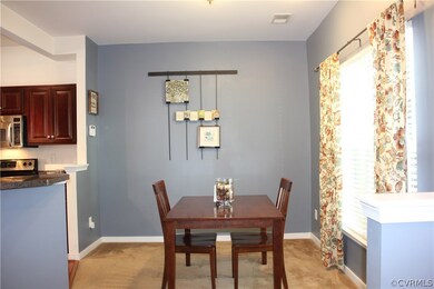 Bright Dining Room adjacent to your kitchen.