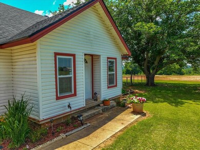 View of front of property with a front lawn