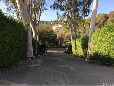 Private driveway with gate entrance from street 