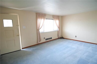 Step in to this light and bright living room, wait