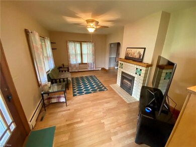 Living Room view 1. Real hardwood flooring.