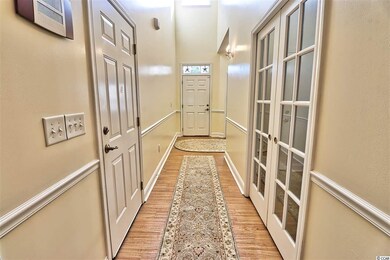 Garage on Right, Laundry Closet, & Bedroom.