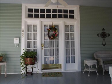 A beautiful front porch welcomes you as you approa