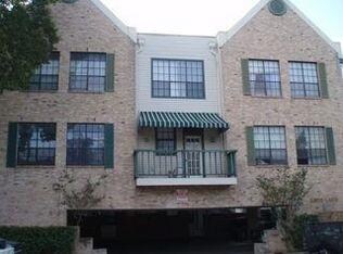 Back of house featuring a balcony