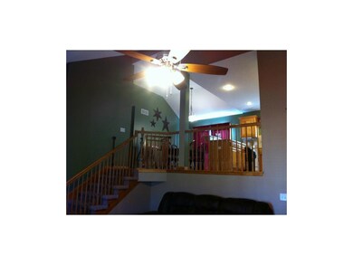 Vaulted ceiling expands open feeling throughout th