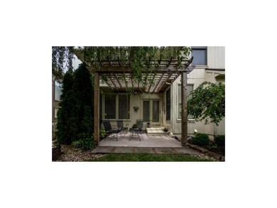 Lovely pergola shades back patio!