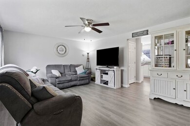 Spacious and bright living room open to kitchen