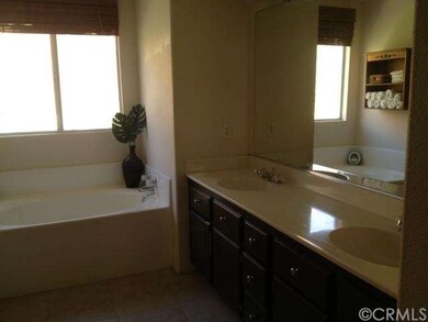 Master Bathroom with dual sinks and seperate Tub