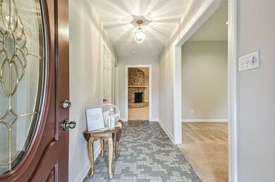 Beautiful front door provides plenty of natural li