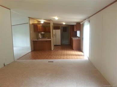 Kitchen view from Family rm.  (Living room on left