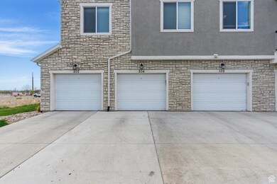 Garage with concrete driveway