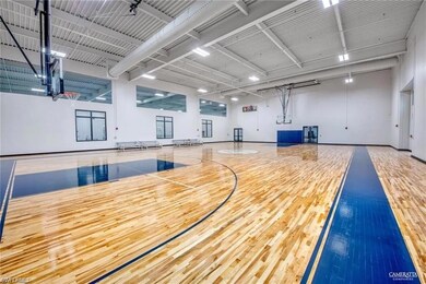 View of sport court featuring community basketball