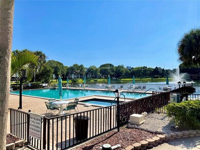 Community Pool Spa overlooking lake and fountain