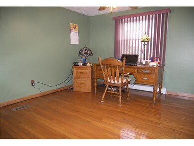 Dining Room. The formal dining room also has hardw