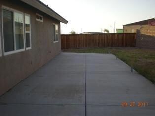 Rear patio is ready for a cover.